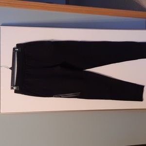 Black joggers with front and right leg side side pocket.